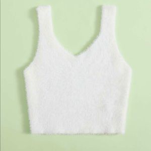 Cute fuzzy white top also available in blue !
